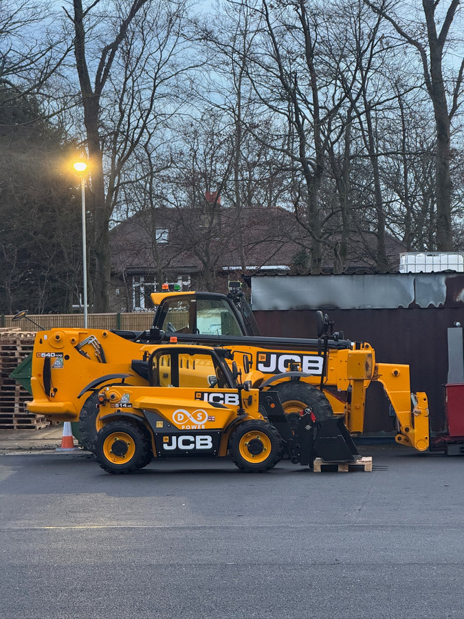 JCB telehandler with a bucket attachment