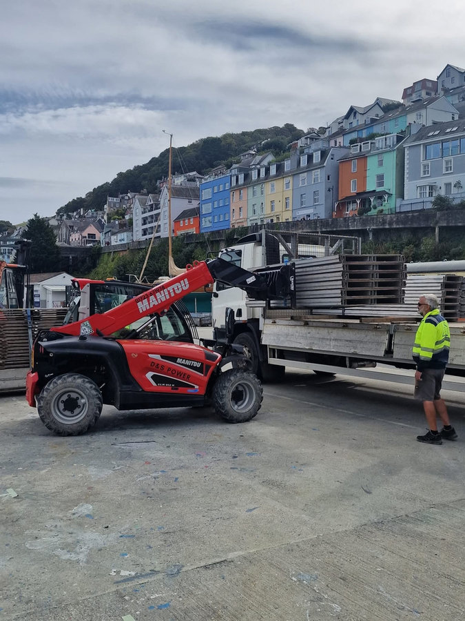 D&S Power Manitou telehandler loading materials beside a lorry in Scarborough